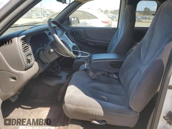 1999 Dodge Dakota SLT z VIN 1B7GL22Y5XS140838, wystawiony jako Copart lot #80016635 z przebiegiem 134 231 mil mil oraz Czysty tytuł • Clean title. Historia ofert i sprzedaży dostępna na DreamBid. Obrazek 7.