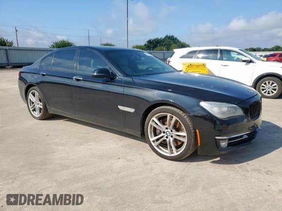 ✅ 2014 BMW 7 Series 750i • VIN: WBAYA8C57ED824970 • Lot: 61005925. Wystawiony na Copart z przebiegiem 144 457 mil. Bezpłatny archiwum sprzedaży aukcyjnych z USA i szczegółowy raport historii pojazdu na DreamBid. Zdjęcie 4.
