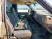 2004 Chevrolet Silverado 1500 Work Truck z VIN 1GCEC14X54Z118864, wystawiony jako Copart lot #81513555 z przebiegiem 186 665 mil mil oraz Szkoda całkowita • Salvage title. Historia ofert i sprzedaży dostępna na DreamBid. Obrazek 10.