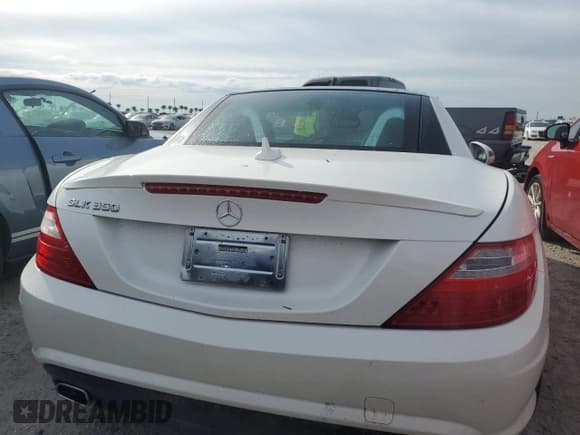 ✅ 2015 Mercedes-Benz SLK 350 • VIN: WDDPK5HAXFF103800 • Lot: 77786054. Listed on Copart with 32,433 mi. Free auction sales archive from the USA and detailed vehicle history report at DreamBid. Image 6.