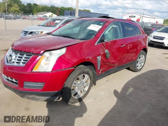✅ 2015 Cadillac SRX • VIN: 3GYFNAE32FS533063 • Lot: 43381614. Listed on IAAI with 87,976 mi. Free auction sales archive from the USA and detailed vehicle history report at DreamBid. Image 17.