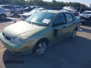 ✅ 2007 Ford Focus S • VIN: 1FAFP34N47W186703 • Lot: 42875486. Wystawiony na IAAI z przebiegiem 118 931 mil. Bezpłatny archiwum sprzedaży aukcyjnych z USA i szczegółowy raport historii pojazdu na DreamBid. Zdjęcie 18.