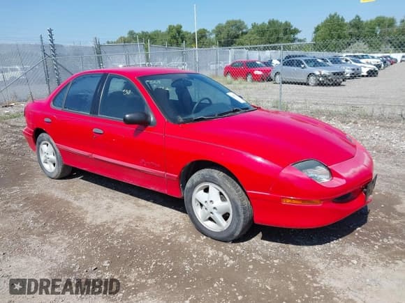 ✅ 1997 Pontiac Sunfire • VIN: 3G2JB52T7VS851025 • Lot: 42637741. Listed on IAAI with 135,344 mi. Free auction sales archive from the USA and detailed vehicle history report at DreamBid. Image 1.