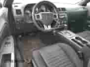 2014 Dodge Challenger SXT 100th Anniversary z VIN 2C3CDYAG2EH262136, wystawiony jako Copart lot #59587035 z przebiegiem 125 769 mil mil oraz Szkoda całkowita • Salvage title. Historia ofert i sprzedaży dostępna na DreamBid. Obrazek 8.