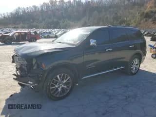 ✅ 2015 Dodge Durango Citadel • VIN: 1C4RDJEGXFC177587 • Lot: 92495695. Listed on Copart with 112,653 mi. Free auction sales archive from the USA and detailed vehicle history report at DreamBid. Image 1.