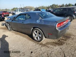✅ 2012 Dodge Challenger SXT • VIN: 2C3CDYAG4CH275676 • Lot: 74502834. Wystawiony na Copart z przebiegiem 99 500 mil. Bezpłatny archiwum sprzedaży aukcyjnych z USA i szczegółowy raport historii pojazdu na DreamBid. Zdjęcie 2.