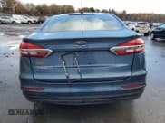 ✅ 2019 Ford Fusion S • VIN: 3FA6P0G77KR129242 • Лот: 90438905. Опубликован ранее на Copart с пробегом 71 785 миль. Бесплатный доступ к архиву аукционных продаж из США и подробный отчёт об истории автомобиля на DreamBid. Изображение 6.
