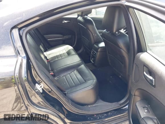 ✅ 2013 Dodge Charger SXT Plus • VIN: 2C3CDXJG1DH584579 • Lot: 42128401. Listed on IAAI with 100,388 mi. Free auction sales archive from the USA and detailed vehicle history report at DreamBid. Image 8.