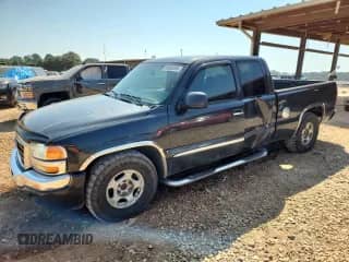 2003 GMC Sierra 1500 SLE with VIN 2GTEC19V831386998, listed as a Copart auction lot 80680395 with 245,385 mi miles and Salvage title. Bid and sale history available at DreamBid. Image 1.