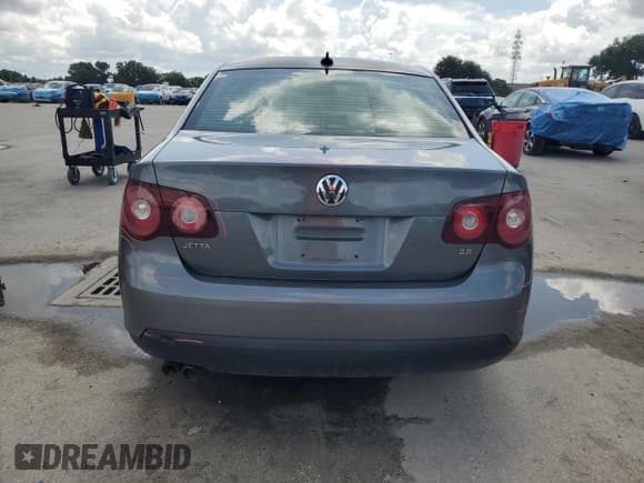 ✅ 2009 Volkswagen Jetta SE • VIN: 3VWRZ71K59M162283 • Lot: 60397055. Listed on Copart with 204,004 mi. Free auction sales archive from the USA and detailed vehicle history report at DreamBid. Image 6.
