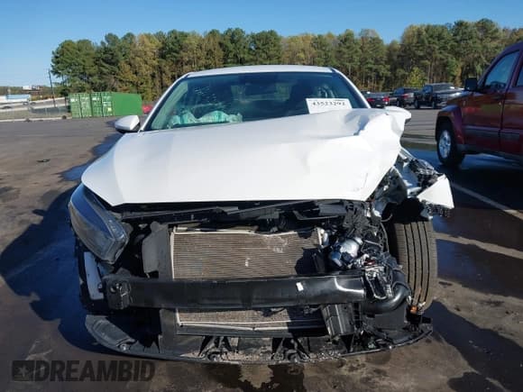 ✅ 2022 Kia Forte LXS • VIN: 3KPF24AD2NE465682 • Lot: 43523292. Listed on IAAI with 67,182 mi. Free auction sales archive from the USA and detailed vehicle history report at DreamBid. Image 18.