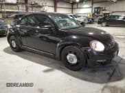 ✅ 2013 Volkswagen Beetle Fender Edition • VIN: 3VWJP7ATXDM670205 • Lot: 47687735. Listed on Copart with 97,909 mi. Free auction sales archive from the USA and detailed vehicle history report at DreamBid. Image 4.