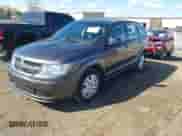 2015 Dodge Journey American Value z VIN 3C4PDCAB1FT637818, wystawiony jako IAAI lot #43497822 z przebiegiem 164 458 mil mil oraz . Historia ofert i sprzedaży dostępna na DreamBid. Obrazek 2.