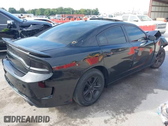 2022 Dodge Charger SXT with VIN 2C3CDXBG7NH220263, listed as a IAAI auction lot 43181220 with 70,888 mi miles and . Bid and sale history available at DreamBid. Image 4.