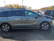 ✅ 2018 Honda Odyssey Touring • VIN: 5FNRL6H85JB044090 • Lot: 43648114. Wystawiony na IAAI z przebiegiem 153 287 mil. Bezpłatny archiwum sprzedaży aukcyjnych z USA i szczegółowy raport historii pojazdu na DreamBid. Zdjęcie 13.