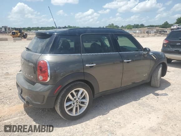 ✅ 2014 MINI Countryman S • VIN: WMWZC5C58EWP35183 • Lot: 62022875. Listed on Copart with 85,571 mi. Free auction sales archive from the USA and detailed vehicle history report at DreamBid. Image 3.