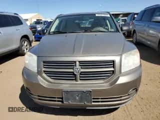 2008 Dodge Caliber SE с VIN 1B3HB28B38D753624, выставлен на аукционе Copart как лот 69327254 с пробегом 165 663 миль миль и Списание • Salvage title. История ставок и продаж доступна на DreamBid. Изображение 5.