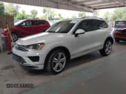 ✅ 2016 Volkswagen Touareg Lux • VIN: WVGEF9BP5GD002473 • Лот: 43312254. Опубликован ранее на IAAI с пробегом 25 158 миль. Бесплатный доступ к архиву аукционных продаж из США и подробный отчёт об истории автомобиля на DreamBid. Изображение 2.