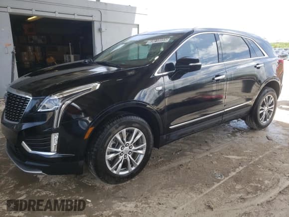 ✅ 2023 Cadillac XT5 AWD Premium Luxury • VIN: 1GYKNDRS5PZ130426 • Лот: 69010055. Опубликован ранее на Copart с пробегом 29 797 миль. Бесплатный доступ к архиву аукционных продаж из США и подробный отчёт об истории автомобиля на DreamBid. Изображение 1.