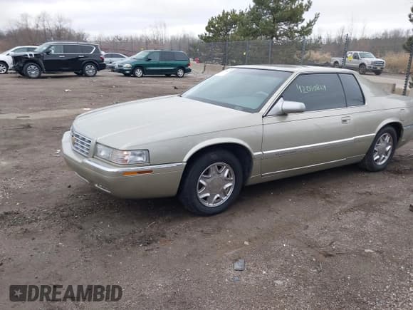 ✅ 1997 Cadillac Eldorado • VIN: 1G6EL12Y8VU606820 • Lot: 42010829. Listed on IAAI with 176,629 mi. Free auction sales archive from the USA and detailed vehicle history report at DreamBid. Image 2.