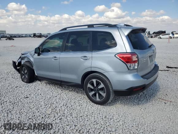 2017 Subaru Forester Limited with VIN JF2SJALC7HH442418, listed as a Copart auction lot 82584035 with 57,114 mi miles and Salvage title. Bid and sale history available at DreamBid. Image 2.