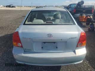 2005 Hyundai Accent GLS z VIN KMHCG45C55U672103, wystawiony jako Copart lot #67539055 z przebiegiem 134 984 mil mil oraz Szkoda całkowita • Salvage title. Historia ofert i sprzedaży dostępna na DreamBid. Obrazek 6.