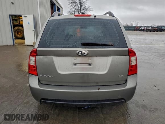 ✅ 2009 Kia Rondo LX • VIN: KNAFG528997267256 • Лот: 93733475. Опубликован ранее на Copart с пробегом 183 507 миль. Бесплатный доступ к архиву аукционных продаж из США и подробный отчёт об истории автомобиля на DreamBid. Изображение 6.