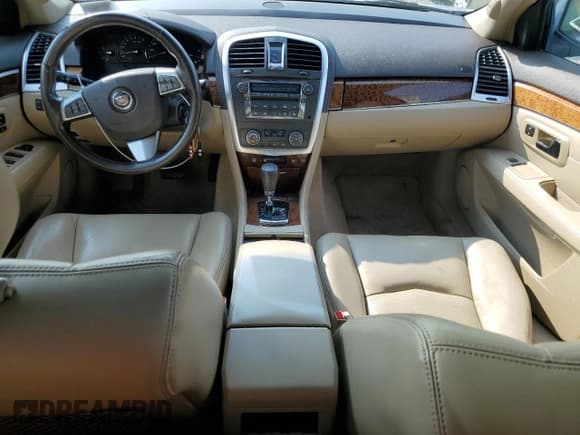 ✅ 2009 Cadillac SRX AWD • VIN: 1GYEE437490115909 • Лот: 59706665. Опубликован ранее на Copart с пробегом 103 928 миль. Бесплатный доступ к архиву аукционных продаж из США и подробный отчёт об истории автомобиля на DreamBid. Изображение 8.