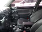 ✅ 2014 Volkswagen Beetle 1.8T • VIN: 3VWJ07AT6EM657490 • Lot: 56752285. Listed on Copart with Not provided. Free auction sales archive from the USA and detailed vehicle history report at DreamBid. Image 9.