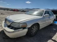 ✅ 2003 Lincoln Town Car Cartier • VIN: 1LNHM83W13Y613610 • Lot: 71822175. Listed on Copart with 138,049 mi. Free auction sales archive from the USA and detailed vehicle history report at DreamBid. Image 1.