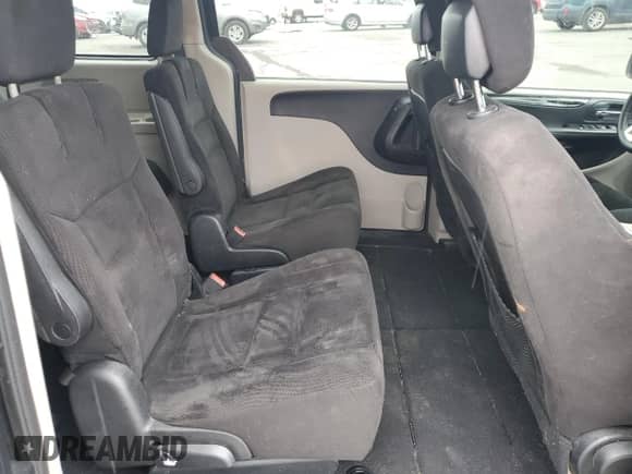 2014 Dodge Grand Caravan SXT с VIN 2C4RDGCG1ER344723, выставлен на аукционе Copart как лот 85332765 с пробегом 145 921 миль миль и Списание • Salvage title. История ставок и продаж доступна на DreamBid. Изображение 11.