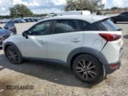 ✅ 2018 Mazda CX-3 Touring • VIN: JM1DKDC77J0305654 • Лот: 81857985. Опубликован ранее на Copart с пробегом 145 800 миль. Бесплатный доступ к архиву аукционных продаж из США и подробный отчёт об истории автомобиля на DreamBid. Изображение 2.