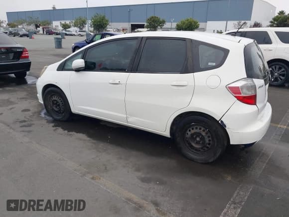 ✅ 2009 Honda Fit • VIN: JHMGE88219C006050 • Lot: 43599814. Listed on IAAI with 187,191 mi. Free auction sales archive from the USA and detailed vehicle history report at DreamBid. Image 3.