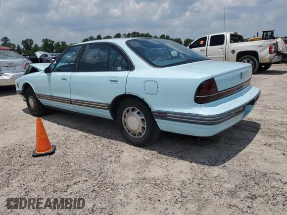 ✅ 1992 Oldsmobile 88 • VIN: 1G3HN53L4NH348979 • Lot: 59209184. Wystawiony na Copart z przebiegiem 144 820 mil. Bezpłatny archiwum sprzedaży aukcyjnych z USA i szczegółowy raport historii pojazdu na DreamBid. Zdjęcie 2.