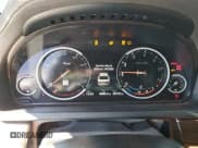 ✅ 2014 BMW 7 Series 740i • VIN: WBAYA6C58ED826697 • Lot: 57130385. Wystawiony na Copart z przebiegiem 50 107 mil. Bezpłatny archiwum sprzedaży aukcyjnych z USA i szczegółowy raport historii pojazdu na DreamBid. Zdjęcie 9.