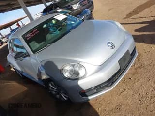✅ 2014 Volkswagen Beetle Entry • VIN: 3VWF17AT3EM638365 • Лот: 41616888. Опубликован ранее на IAAI с пробегом 122 676 миль. Бесплатный доступ к архиву аукционных продаж из США и подробный отчёт об истории автомобиля на DreamBid. Изображение 1.