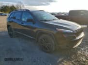 ✅ 2014 Jeep Cherokee Latitude • VIN: 1C4PJMCS4EW309099 • Lot: 94915305. Listed on Copart with 138,612 mi. Free auction sales archive from the USA and detailed vehicle history report at DreamBid. Image 4.