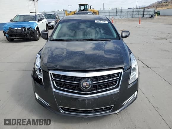 ✅ 2014 Cadillac XTS Premium • VIN: 2G61V5S81E9130942 • Лот: 65571695. Опубликован ранее на Copart с пробегом 73 345 миль. Бесплатный доступ к архиву аукционных продаж из США и подробный отчёт об истории автомобиля на DreamBid. Изображение 5.