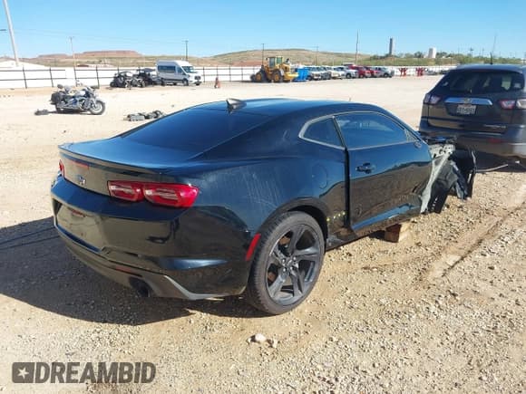 ✅ 2022 Chevrolet Camaro 1LT • VIN: 1G1FB1RS7N0135474 • Lot: 43574698. Listed on IAAI with 89,078 mi. Free auction sales archive from the USA and detailed vehicle history report at DreamBid. Image 4.