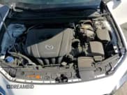 ✅ 2021 Mazda 3 S • VIN: JM1BPAAL8M1331668 • Lot: 82009625. Listed on Copart with 87,747 mi. Free auction sales archive from the USA and detailed vehicle history report at DreamBid. Image 16.