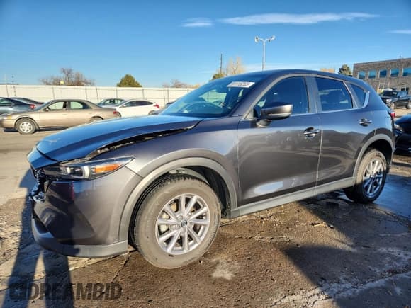 ✅ 2022 Mazda CX-5 S Carbon Edition • VIN: JM3KFBCM2N0587463 • Lot: 91115255. Listed on Copart with 48,302 mi. Free auction sales archive from the USA and detailed vehicle history report at DreamBid. Image 1.