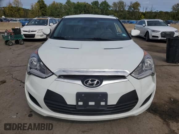 2013 Hyundai Veloster w/Gray Int с VIN KMHTC6AD0DU167414, выставлен на аукционе Copart как лот 73476894 с пробегом 119 928 миль миль и Списание • Salvage title. История ставок и продаж доступна на DreamBid. Изображение 5.