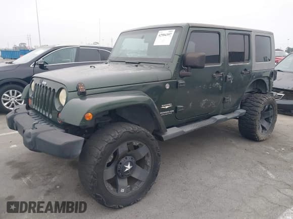 ✅ 2007 Jeep Wrangler Unlimited Sahara • VIN: 1J4GA59147L218594 • Lot: 42984397. Listed on IAAI with 108,296 mi. Free auction sales archive from the USA and detailed vehicle history report at DreamBid. Image 19.