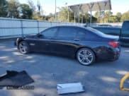 ✅ 2014 BMW 7 Series ALPINA B7 • VIN: WBAYE8C58ED136139 • Lot: 91629365. Listed on Copart with 146,223 mi. Free auction sales archive from the USA and detailed vehicle history report at DreamBid. Image 2.