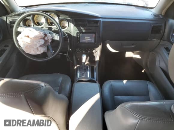 2005 Dodge Magnum RT с VIN 2D8GV582X5H124753, выставлен на аукционе Copart как лот 81355944 с пробегом 136 951 миль миль и Списание • Salvage title. История ставок и продаж доступна на DreamBid. Изображение 8.