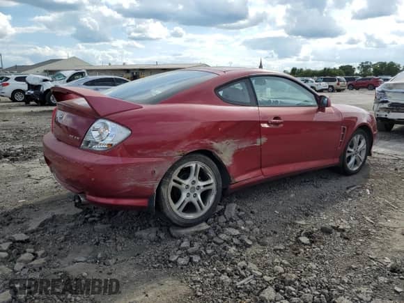 2005 Hyundai Tiburon GT with VIN KMHHN65F25U160235, listed as a Copart auction lot 83780185 with 209,095 mi miles and Non repairable. Bid and sale history available at DreamBid. Image 3.