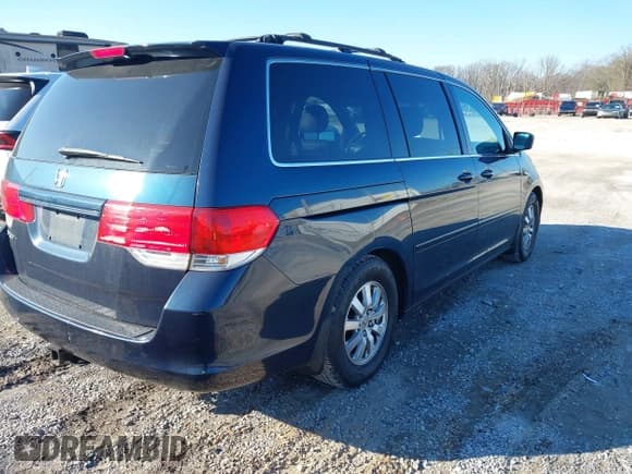 ✅ 2010 Honda Odyssey EX-L • VIN: 5FNRL3H74AB058097 • Lot: 43907585. Listed on IAAI with 177,309 mi. Free auction sales archive from the USA and detailed vehicle history report at DreamBid. Image 4.
