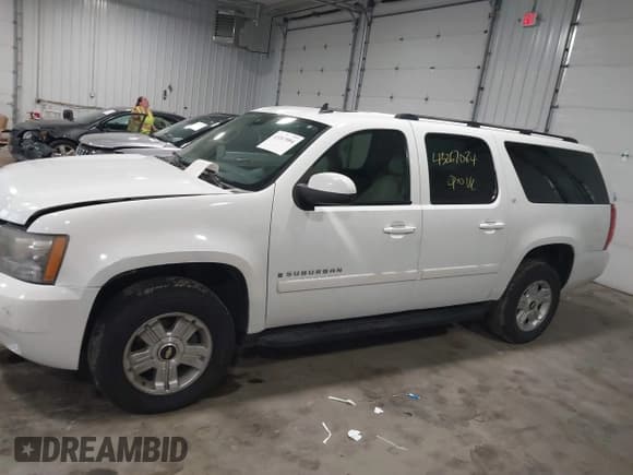 ✅ 2007 Chevrolet Suburban LT • VIN: 1GNFK16397J300658 • Lot: 43267084. Listed on IAAI with 201,521 mi. Free auction sales archive from the USA and detailed vehicle history report at DreamBid. Image 14.
