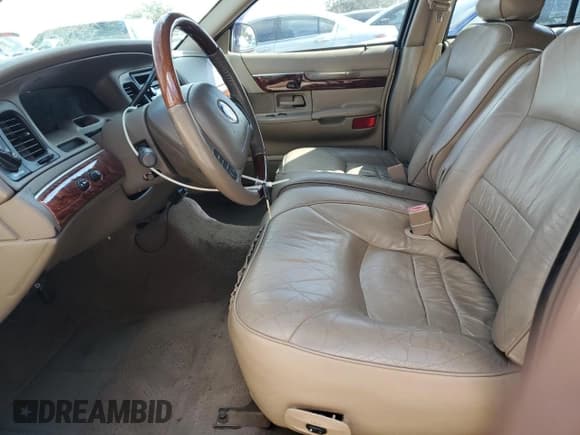 ✅ 2002 Mercury Grand Marquis LS Premium • VIN: 2MEFM75W72X664691 • Лот: 87368725. Опубликован ранее на Copart с пробегом 132 160 миль. Бесплатный доступ к архиву аукционных продаж из США и подробный отчёт об истории автомобиля на DreamBid. Изображение 7.