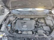 ✅ 2016 Mazda CX-5 Grand Touring • VIN: JM3KE2DY4G0906899 • Lot: 93922385. Wystawiony na Copart z przebiegiem 81 571 mil. Bezpłatny archiwum sprzedaży aukcyjnych z USA i szczegółowy raport historii pojazdu na DreamBid. Zdjęcie 12.